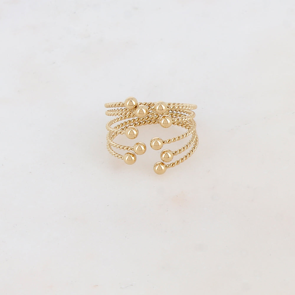 Mathilde & Filles bijoux | Bague composée de cinq anneaux torsadés et fins embellis de petites boules dorées à chaque extrémité