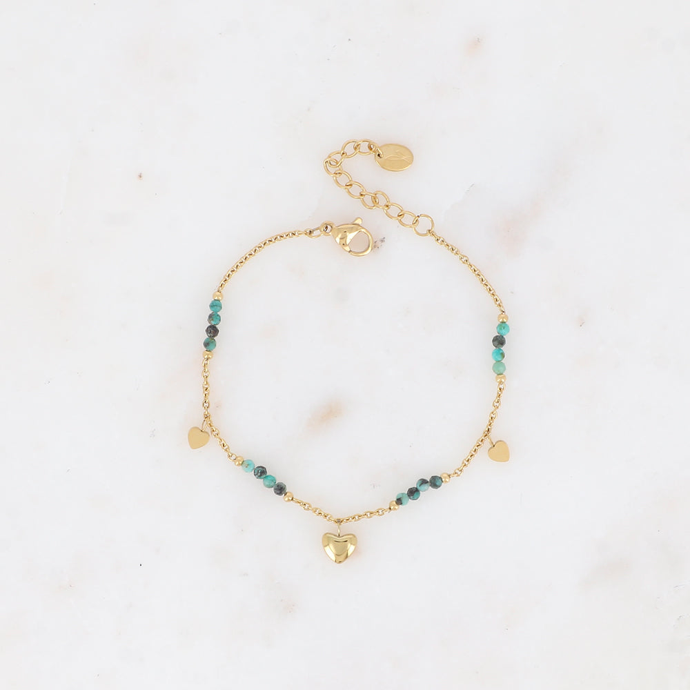 Bracelet en acier inoxydable pour femme orné de perles en turquoise africaine et de pampilles en forme de cœur | Mathilde & Filles bijoux