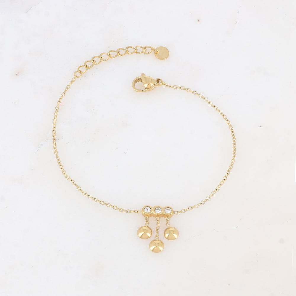 Mathilde & Filles | Bracelet femme embelli de trois zircons et trois chaines tombantes avec boules