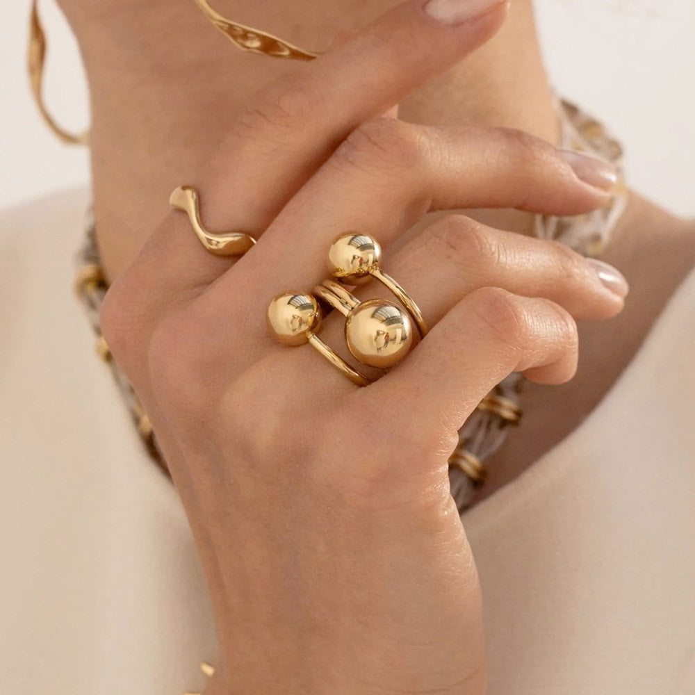 Mathilde & Filles | Bague en acier inoxydable doré embellie de trois boules