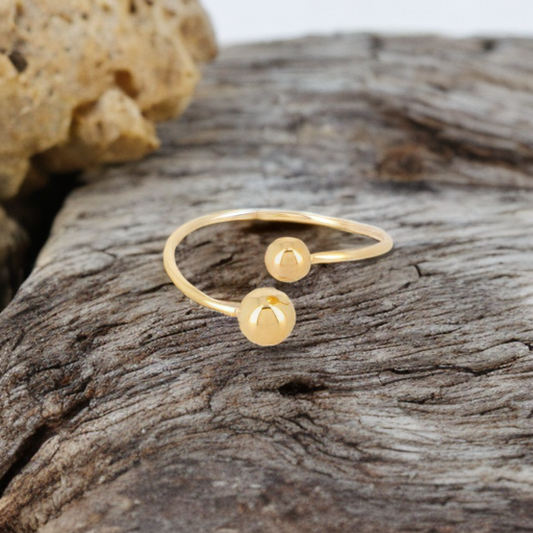 Mathilde & Filles - Bague fine pour femme en acier inoxydable embellie d'une boule à chaque extrémité 