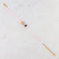 Mathilde & Filles | Bracelet cordon rose embelli d'un cabochon doré et deux pierres naturelles