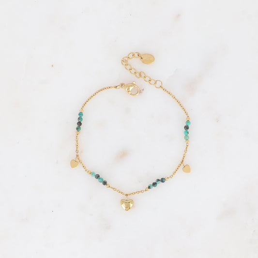 Bracelet en acier inoxydable pour femme orné de perles en turquoise africaine et de pampilles en forme de cœur | Mathilde & Filles bijoux