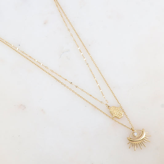 Mathilde & Filles | Collier en acier inoxydable au style beldi composé de deux chaines avec un pendentif main de Fatma et un œil