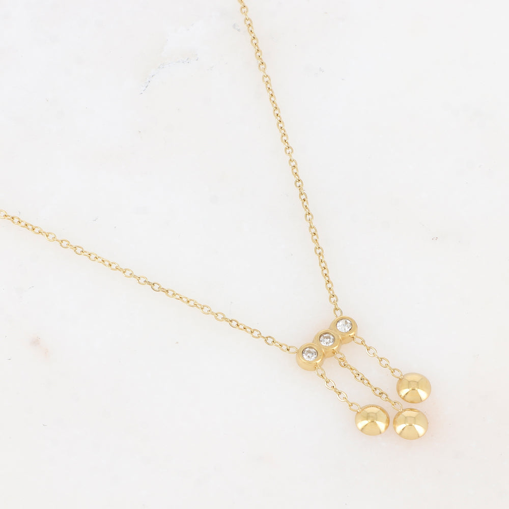 Mathilde & Filles | Collier femme en acier inoxydable serti de trois zircons ainsi de trois petites chainettes portants trois boules délicates