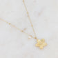 Mathilde & Filles | Collier pour femme en acier inoxydable doré à l'or fin embelli d'un pendentif fleur parfaitement sculptée et serti d'une petite perle de culture