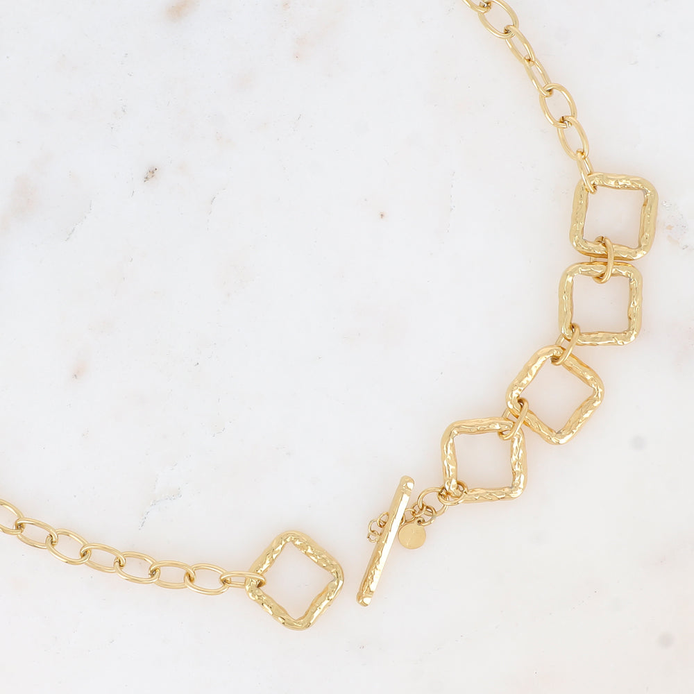 Mathilde & Filles | Collier en acier inoxydable au style imposant composé d'une chaine en grosse maille et gros carrés avec un fermoir en T