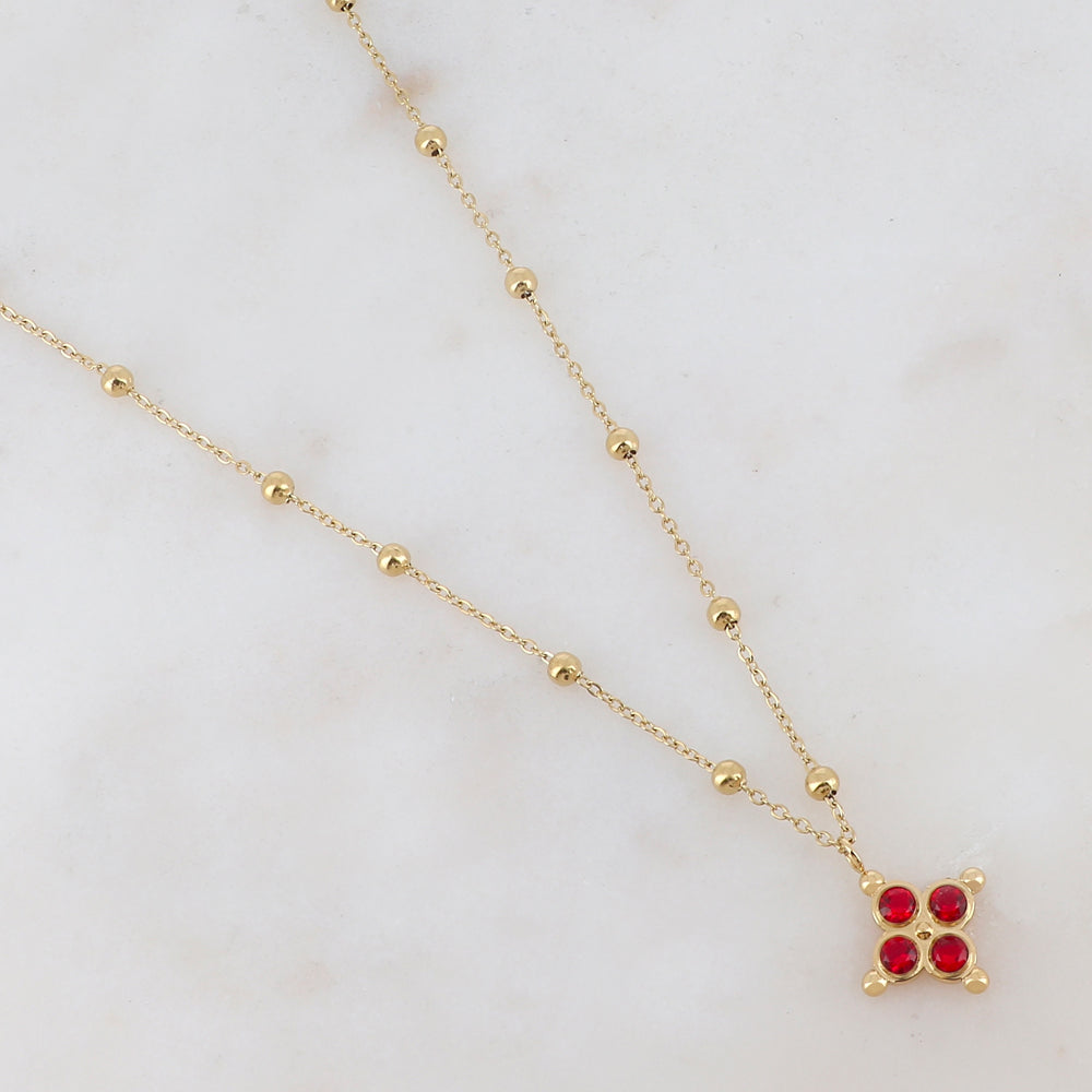 Mathilde & Filles | Collier en acier inoxydable pour femme avec une chaine embellie de boules et un pendentif serti de zircons rouges