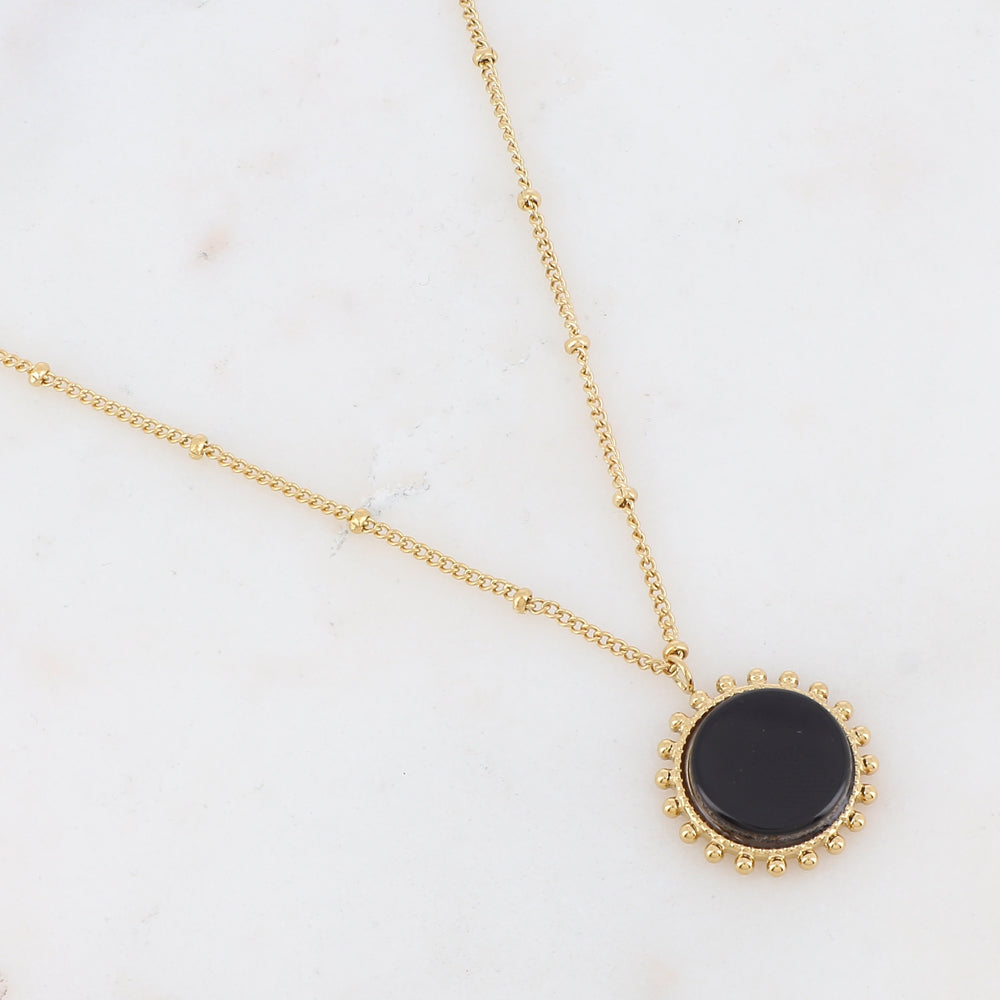 Mathilde & Filles | Collier pour femme embelli d'un pendentif soleil serti d'une pierre naturelle onyx noire