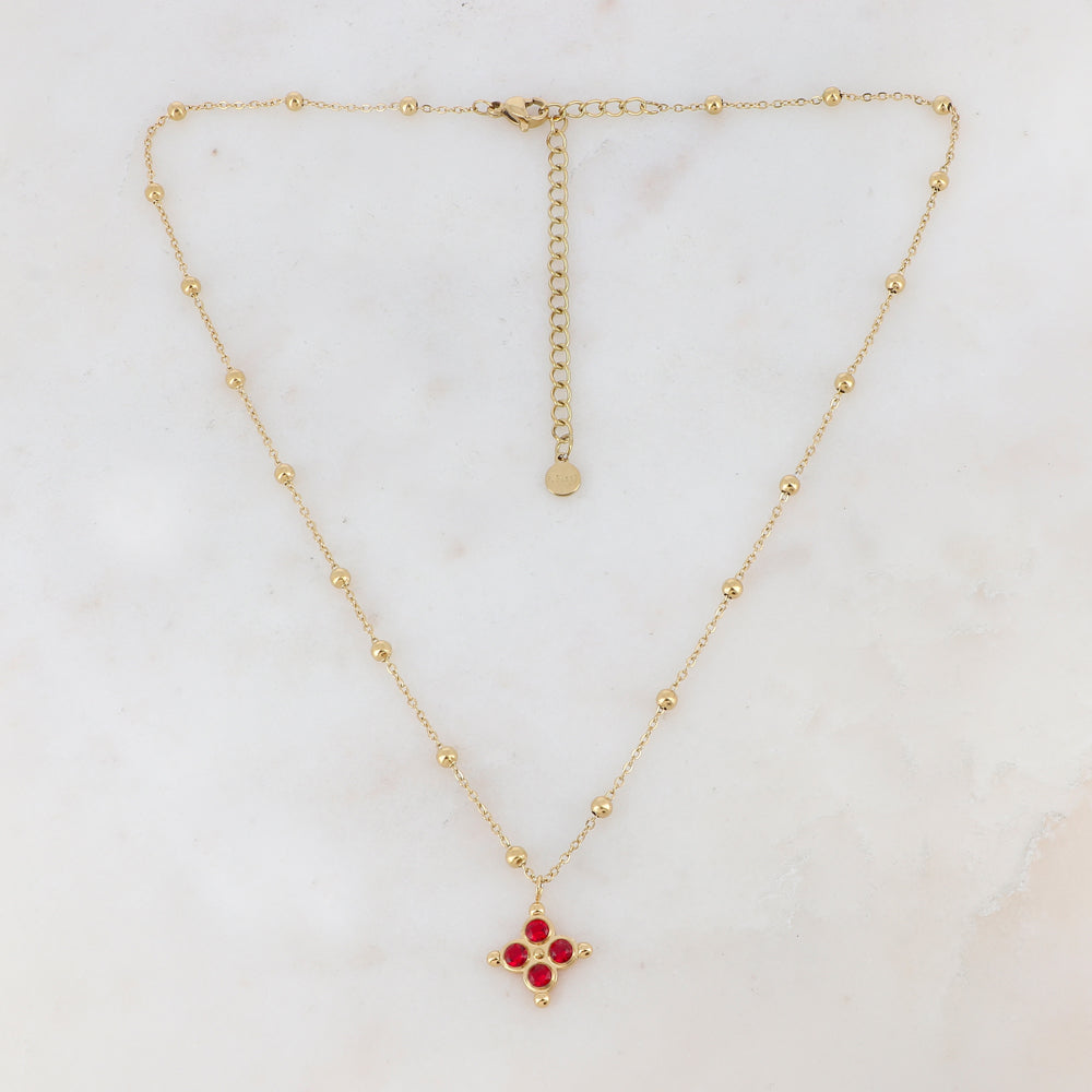 Mathilde & Filles | Collier embelli d'un pendentif serti de zircons rouges