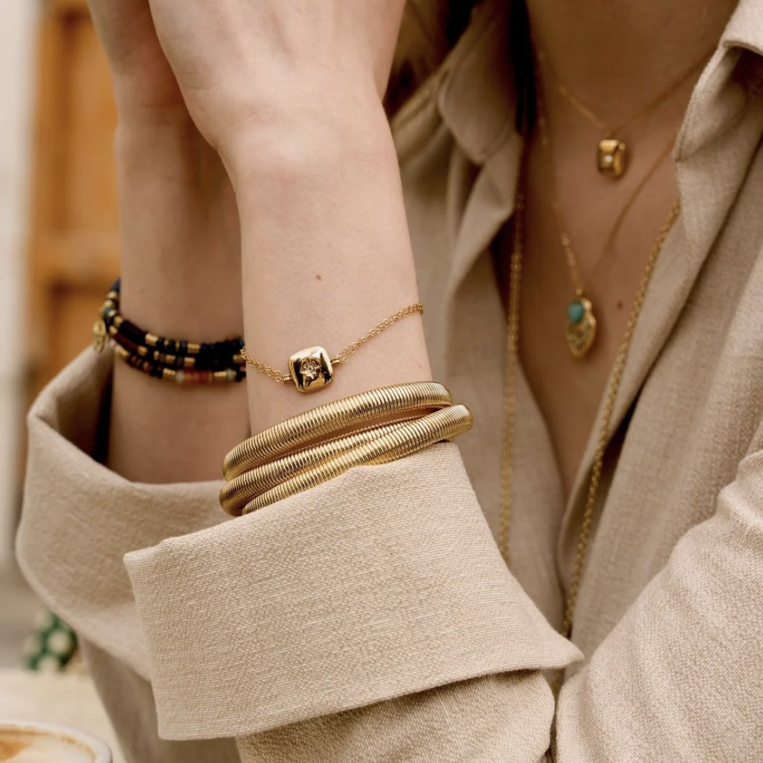 Manchette en acier inoxydable composée de trois rangs entrelacés et striés | Mathilde & Filles bijoux