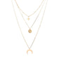 Collier trois chaînes dorées avec une étoile scintillante une pièce martelée et un croissant de lune |Mathilde & Filles